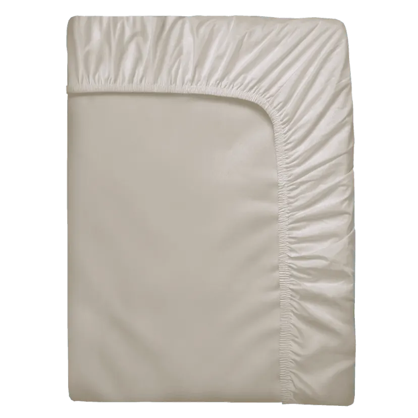 Drap-housse beige plié, avec un pourtour entièrement élastiqué